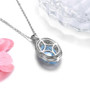 back view of sky blue topaz citrine and zircon pendant necklace in rhodium over sterling silver