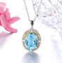 sky blue topaz citrine and zircon pendant necklace in rhodium over sterling silver shown in a lifestyle photo