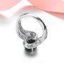 back view of chrome diopside black spinel and white zircon ring in black and white rhodium over sterling silver