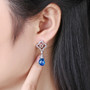 briolette swiss blue topaz and diamond 18k white gold drop earrings shown for size comparison