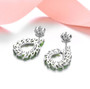 back view of chrome diopside and white zircon earrings in rhodium over sterling silver