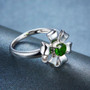 side view of chrome diopside flower ring in rhodium over sterling silver