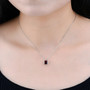 garnet solitaire pendant necklace in rhodium over sterling silver worn around the neck