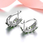 back view of chrome diopside post omega earrings in rhodium over sterling silver