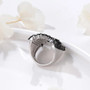 full view of black spinel wide band cluster ring in rhodium over sterling silver
