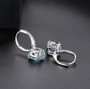 back view of sky blue topaz cushion earrings in rhodium over sterling silver