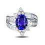 front view of tanzanite and diamond bypass ring in 18k white gold