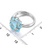 sky blue topaz halo ring in rhodium over sterling silver shown for size comparison