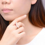 freshwater pearl and garnet rhodium over sterling silver modern ring worn on a hand