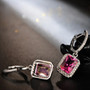 back view of pink topaz emerald cut and diamond halo dangle earrings in 14k white gold