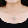 white topaz cross necklace in rhodium over sterling silver worn around the neck