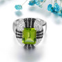 front view of peridot black spinel and white zircon statement ring in rhodium over sterling silver