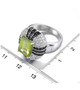peridot black spinel and white zircon statement ring in rhodium over sterling silver shown for size comparison