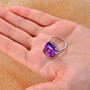 amethyst and diamond 14k white gold ring in hand