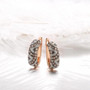 champagne and white diamond hoop earrings in 14k rose gold shown in a lifestyle photo
