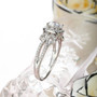 side view of moissanite elegant halo ring in rhodium over sterling silver
