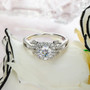 front view of moissanite elegant halo ring in rhodium over sterling silver