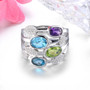 front view of amethyst peridot blue topaz and zircon openwork ring in rhodium over sterling silver