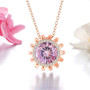 rose de france amethyst fancy round concave cut halo necklace in 18k rose gold over sterling silver shown in a lifestyle photo