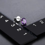 amethyst 7x5mm cushion cut stud earrings in rhodium over sterling silver shown for size comparison
