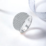 moissanite pave cluster wide band ring in rhodium over sterling silver shown in a lifestyle photo