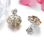 back view of amethyst citrine and white zircon cluster earrings in rhodium over sterling silver