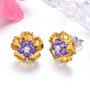 side view of amethyst citrine and white zircon cluster earrings in rhodium over sterling silver