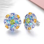 side view of peridot swiss blue topaz tanzanite citrine and zircon cluster stud earrings in rhodium over sterling silver