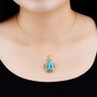 sky blue topaz garnet citrine and white zircon pendant necklace in 18k yellow gold over sterling silver worn around the neck
