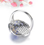 back view of tanzanite and white zircon ring in rhodium over sterling silver