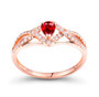 ruby and diamond infinity design ring in 14k rose gold shown in a lifestyle photo