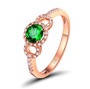 front view of tsavorite garnet and diamond ring in 18k rose gold