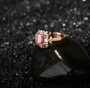 regal pink tourmaline and diamond ring in 18k rose gold shown in a lifestyle photo