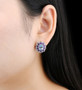 blue topaz amethyst citrine and zircon halo stud earrings in rhodium over sterling silver worn on the ear