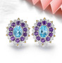 blue topaz amethyst citrine and zircon halo stud earrings in rhodium over sterling silver shown in a lifestyle photo