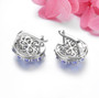 back view of tanzanite and zircon cluster earrings in rhodium over sterling silver