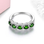 front view of chrome diopside and zircon band ring in rhodium over sterling silver