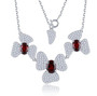 sky blue topaz and zircon flowering necklace in rhodium over sterling silver