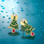 lab ruby and cubic zirconia christmas tree stud earrings in 18k yellow gold over sterling silver shown in a lifestyle photo