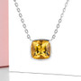 9mm cushion cut citrine bezel set necklace in rhodium over sterling silver shown in a lifestyle photo