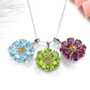 full view of sky blue topaz and citrine necklace in rhodium over sterling silver