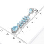 sky blue topaz and white zircon drop earrings in rhodium over sterling silver shown for size comparison