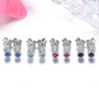 close up of bezel set 3 5mm round tanzanite stud earrings in 10k white gold