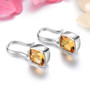 side view of citrine 9mm square cushion bezel set fishhook earrings in rhodium over sterling silver