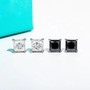 white or black moissanite princess cut stud earrings in 10k white gold