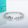 clasp detail of 6 5mm round moissanite tennis bracelet in rhodium over sterling silver
