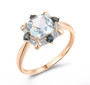 front view of sky blue topaz london blue topaz and diamond halo ring in 14k rose gold