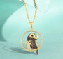double owl cz necklace in 18k yellow gold over sterling silver shown in a lifestyle photo