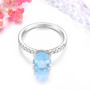 front view of oval aquamarine and diamond ring in 14k white gold