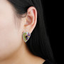 designer multi gemstone earrings in rhodium over sterling silver worn on the ear